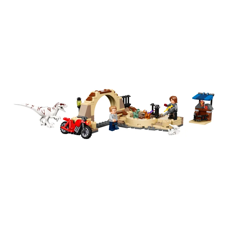 LEGO Atrociraptor dinosaurus motorachtervolging